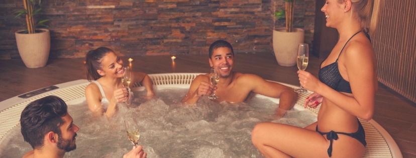 Friends relax at 4 Person Hot Tubs