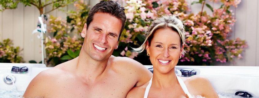 Happy couple relax clean hot tub