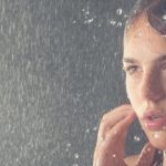 The girl take bath with rain shower head