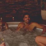 4 person soaking on hot tub